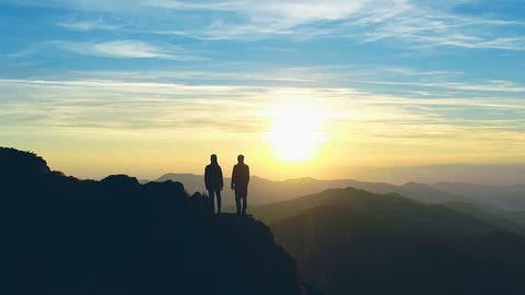 person standing on rock epic mountain Stock Footage Video (100% Royalty ...