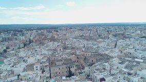 Aerial video. Old Town of Monopoli - city on Adriatic Sea. Province of Bari, region of Apulia. Italy. 4K