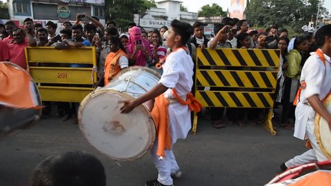 AMRAVATI, MAHARASHTRA - SEPTEMBER 27, 2018: people performing worship of Hindu god Ganesh and carrying to be immersion with drums and music on the last day of Ganesh Chaturthi festival.