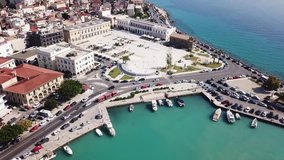 Aerial drone top view video of iconic main picturesque city and port of Zakynthos island with deep turquoise sea color, Ionian, Greece