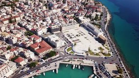 Aerial drone top view video of iconic and historic main square of Solomos in city and main port of Zakynthos island, Ionian, Greece
