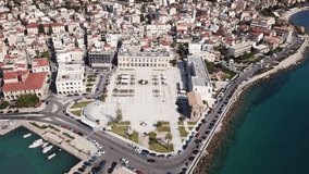 Aerial drone top view video of iconic and historic main square of Solomos in city and main port of Zakynthos island, Ionian, Greece