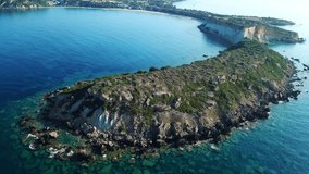 Aerial drone view video of Gerakas beach and rocky peninsula, a clear water sandy shore and natural protected hatchery of Caretta-Caretta sea turtles, Zakynthos island, Ionian, Greece