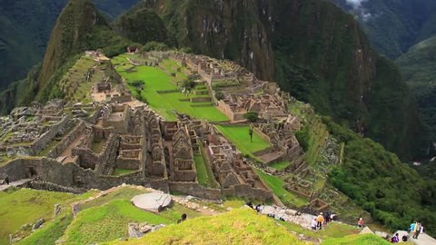 Slow Pan up of the Iconic Viewpoint at Machu Picchu in Peru.