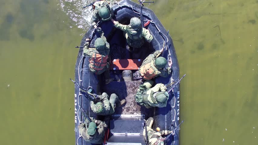 Marines Leave the Shore on the Boat