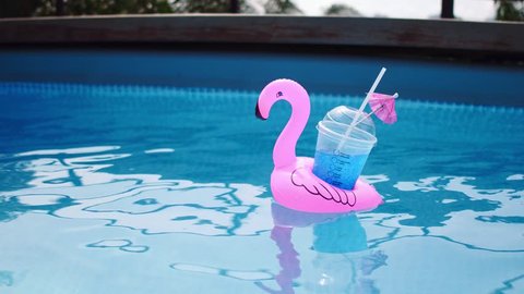 Blue cocktail in the pool.