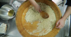 Vertical clip of chef Preparing traditional asian rice