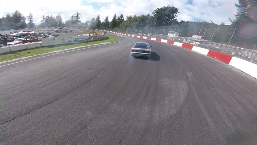 Racing drone chasing a drift car