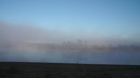 Morning landscape. Fog over water.