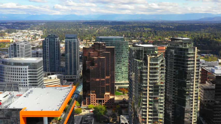Downtown city aerials Bellevue Washington USA 4k 30p
