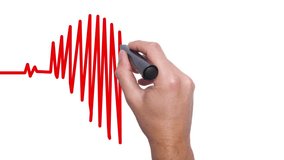 Businessman hand drawing chart heartbeat - Man Hand writing with marker. Health concept. Heart Beat in shape of heart. 4k - Powered by Shutterstock - Get 15% off with code: PIKWIZARD15