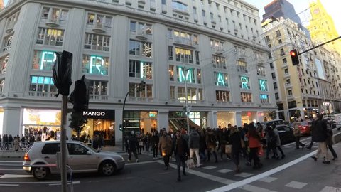 MADRID, SPAIN 30 NOVEMBER, 2017; Shopping custumers in the biggest Primark store in Europe. Entrance of the Primark store at Gran Via in Madrid