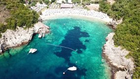 Aerial drone video of popular beach of Mikri Amos near iconic area of Sivota, Epirus, Ionian, Greece