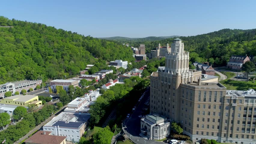 Drone Shot of Hot Springs, Arkansas, Moving Past Large Building