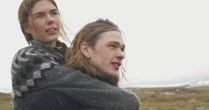 Happy couple making a wanderlust experience traveling in Iceland. Conceptual video about vacation, lifestyle and nature
