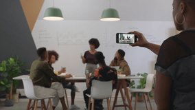 happy business people celebrating success enjoying corporate victory team leader woman excited colleague using smartphone taking video of presentation sharing on social media - Powered by Shutterstock - Get 15% off with code: PIKWIZARD15