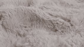 Hairy fur blanket surface slow panning 4K footage