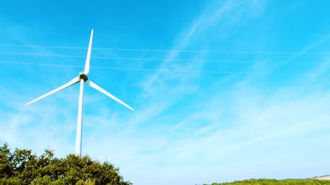 Wind energy generator renewable turbine windmill power clean and renewable resources.wind energy plant power turbine,wind energy clean fields blue sky does not pollute the environment. 