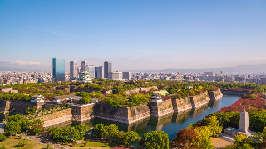 Osaka, Japan cityscape and castle.