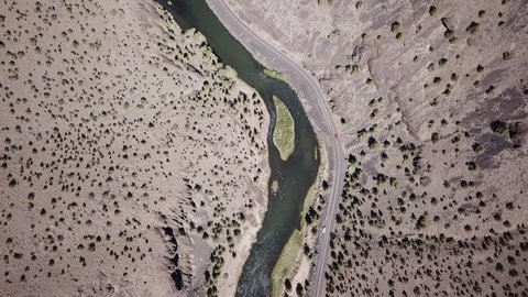 Birds eye view while in Flight in the high desert of central Oregon over premier flyfishing trout stream in the crooked river canyon