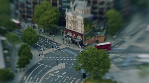 Timelapse of traffic outside Elephant and Castle Underground station in London from above. Tilt shift miniaturising effect.