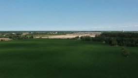 Aerial footage of a farmers fields. Beautiful green growth. Binbrook, ON