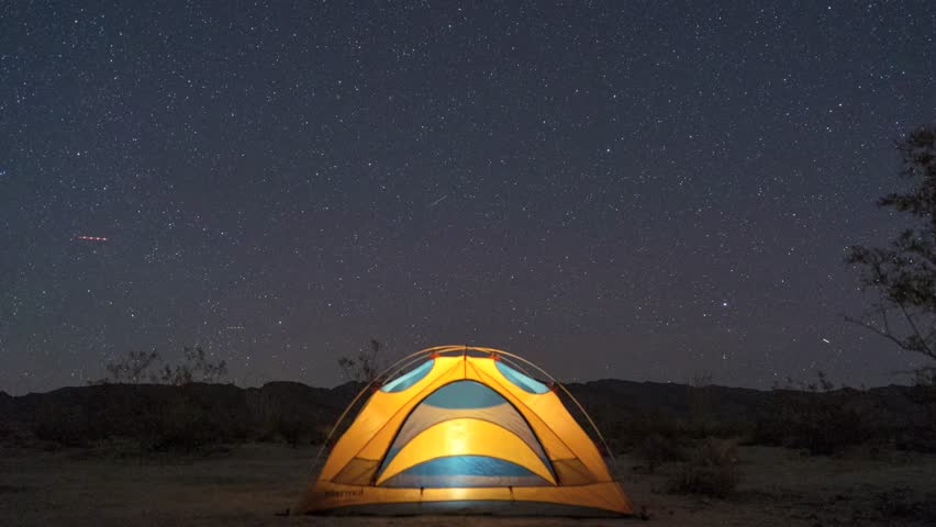 Stars over a Glowing Tent - Time Lapse