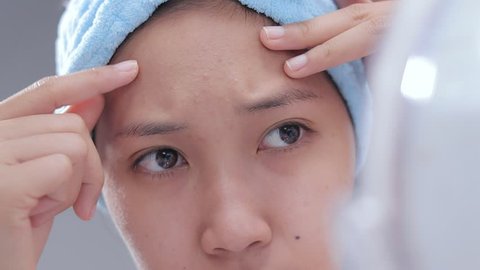 Acne on the face of women