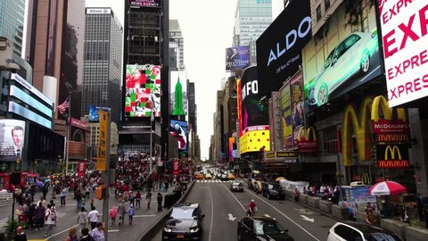 NEW YORK CITY, USA - SEPT 22, 2018: Aerial low angle drone shot of Times Square advertisement billboards skyscrapers in NYC  . NYC is a popular tourist travel destination.
