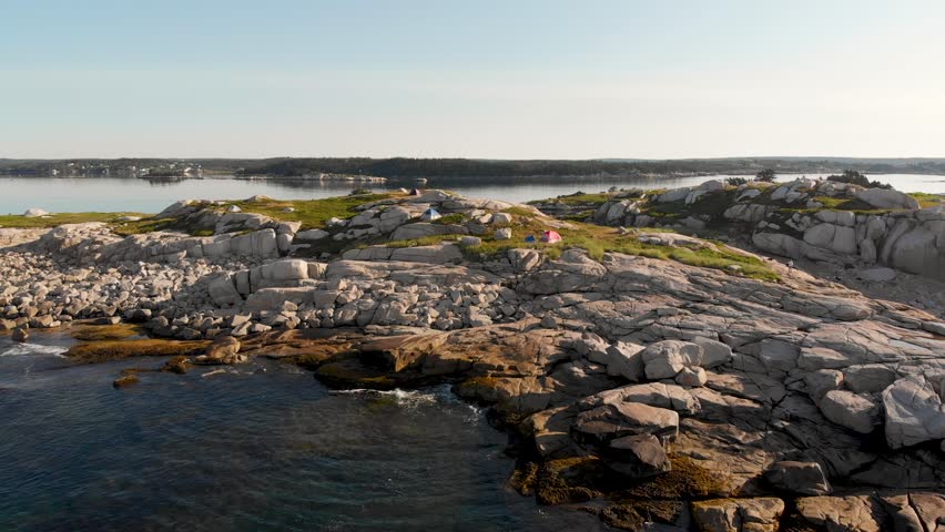 AERIAL: Flying Over Campsite on Island