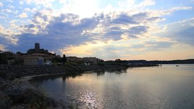 time lapse of mediterranean village of Guissan and marine pond at sunset  , Aude in the south of France
