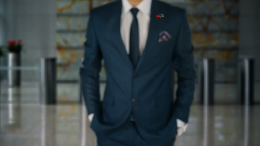 Businessman Walking Towards Camera With Friend Country Flags Pin Taiwan - Finland