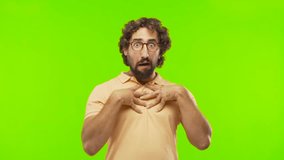 young bearded silly man surprised against chroma key editable background. ready to cut out the person.