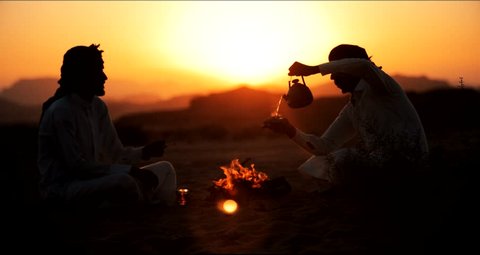 Wadi Rum / Jordan - September 16 2018: Bedouin men make tea Jordan Wadi Rum Desert