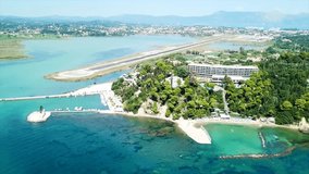 Aerial drone bird's eye view video of famous area of Kanoni near iconic Pontikonissi and airport of Corfu island, Ionian ,Greece