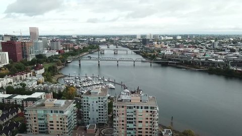This is an aerial hyper time lapse of Portland river and bridges