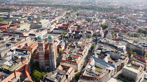 Aerial panoramic view of cityscape of Munich, Frauenkirche cathedral in historic city center, capital city of Bavaria from above - Germany, Europe