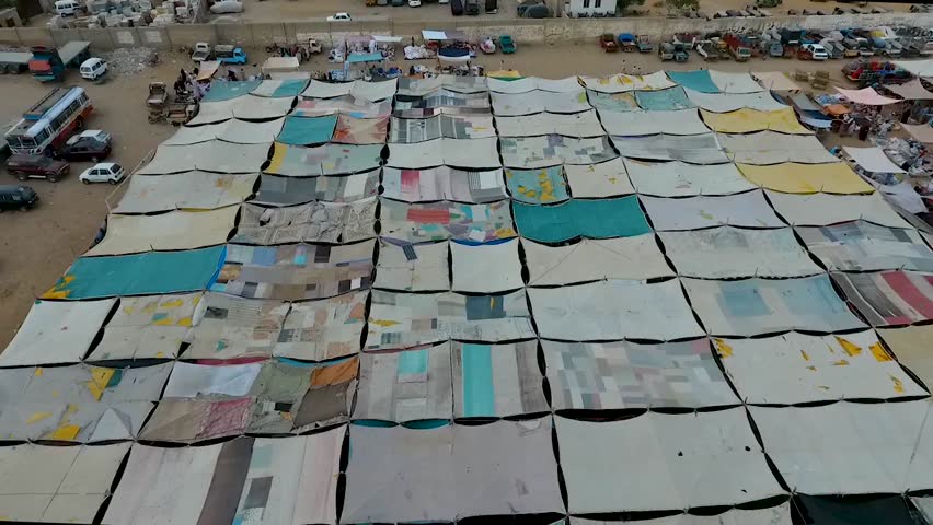 Aerial view of a busy local Bazaar, market here near a slum area. 