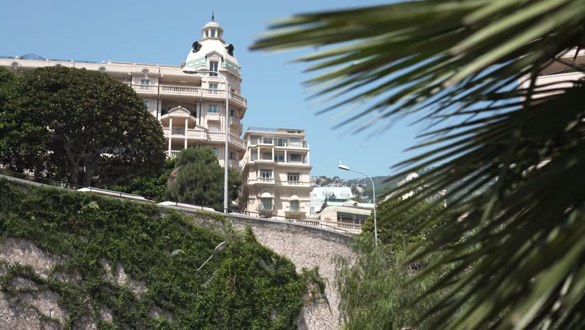 Street in Monaco, birds flying around