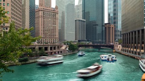 Time-lapse of boats travling on the Chicago River in Downtown Chicago