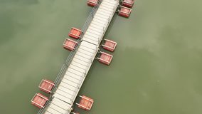Aerial view of a pontoon bridge at at Lake Okutama, Japan.