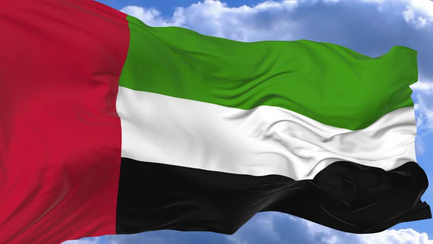 flag waving in the wind against the blue sky United Arab Emirates Royalty-Free Stock Footage #1017500257