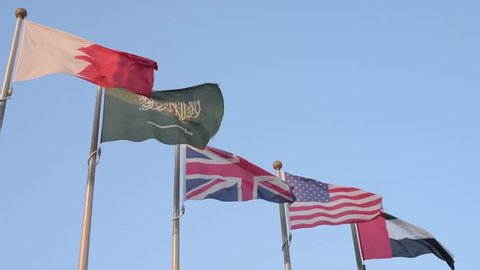 BHR, SA, UK, US, and UAE flag all waving nex to each other in Slow motion!