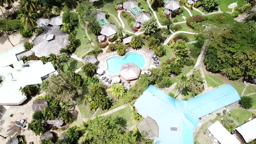 resort swimming pool tracking from above
