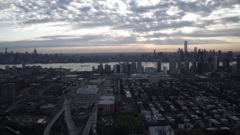 New York City Circa-2015, wide angle aerial view of the Manhattan skyline from Jersey City, with sunbeams shining from the sky