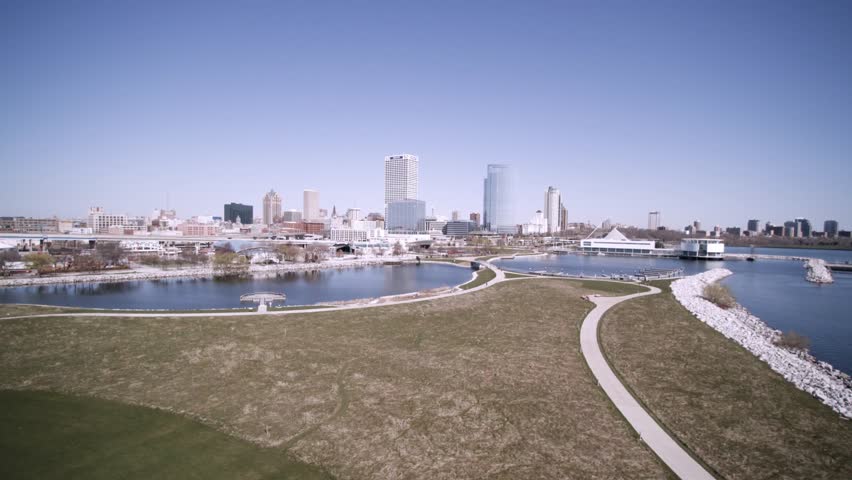 Beautifful left to right aerial view of Downtown Milwaukee city skyline on a bright clear day.