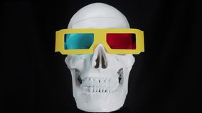 skull with 3d film glasses .