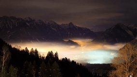 Beautiful 4k UHD timelapse video of the village Brand in the valley of the Brandnertal in the mountains of the Alps in Vorarlberg, Austria, at night with lights