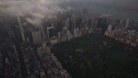 New York City Circa-2015, aerial view of Midtown Manhattan from Central Park with fog and low level clouds at sunrise