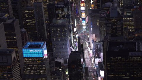 New York City Circa-2015, telephoto aerial view approaching Time Square at night
